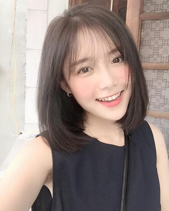 Tóc uốn cụp ngang vai